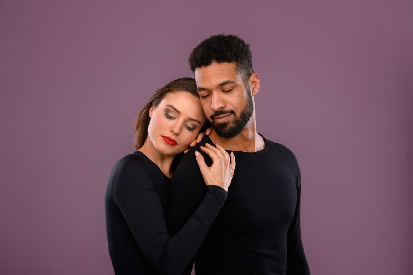 Portrait of young multiracial couple, studio shoot.